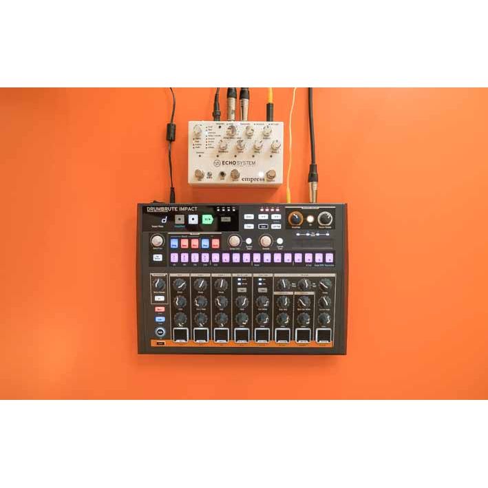 DRUMBRUTE Impact by Arturia | Streamlined analog drum machine with high-energy, big-attitude sounds,  with included software