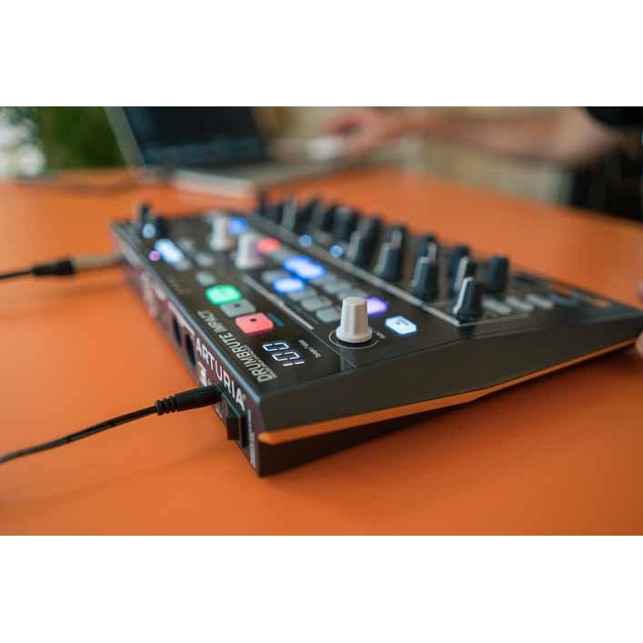 DRUMBRUTE Impact by Arturia | Streamlined analog drum machine with high-energy, big-attitude sounds,  with included software